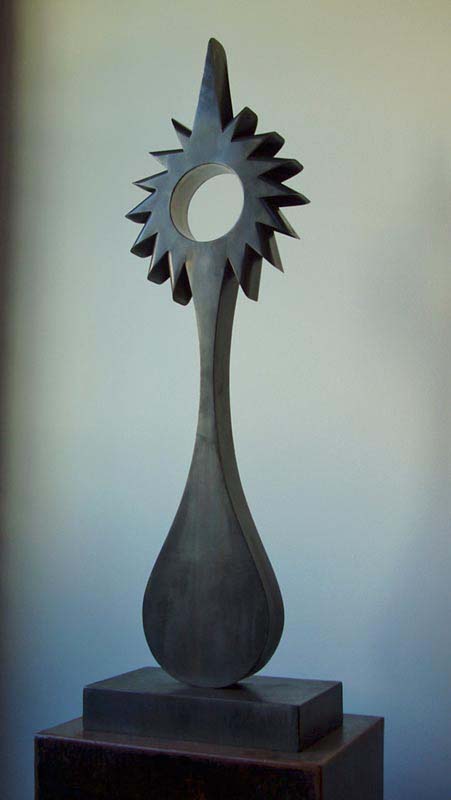 steel sculpture on a pedestal that looks like a thistle plant